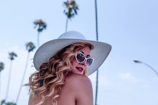 Woman wearing sunglasses at the beach