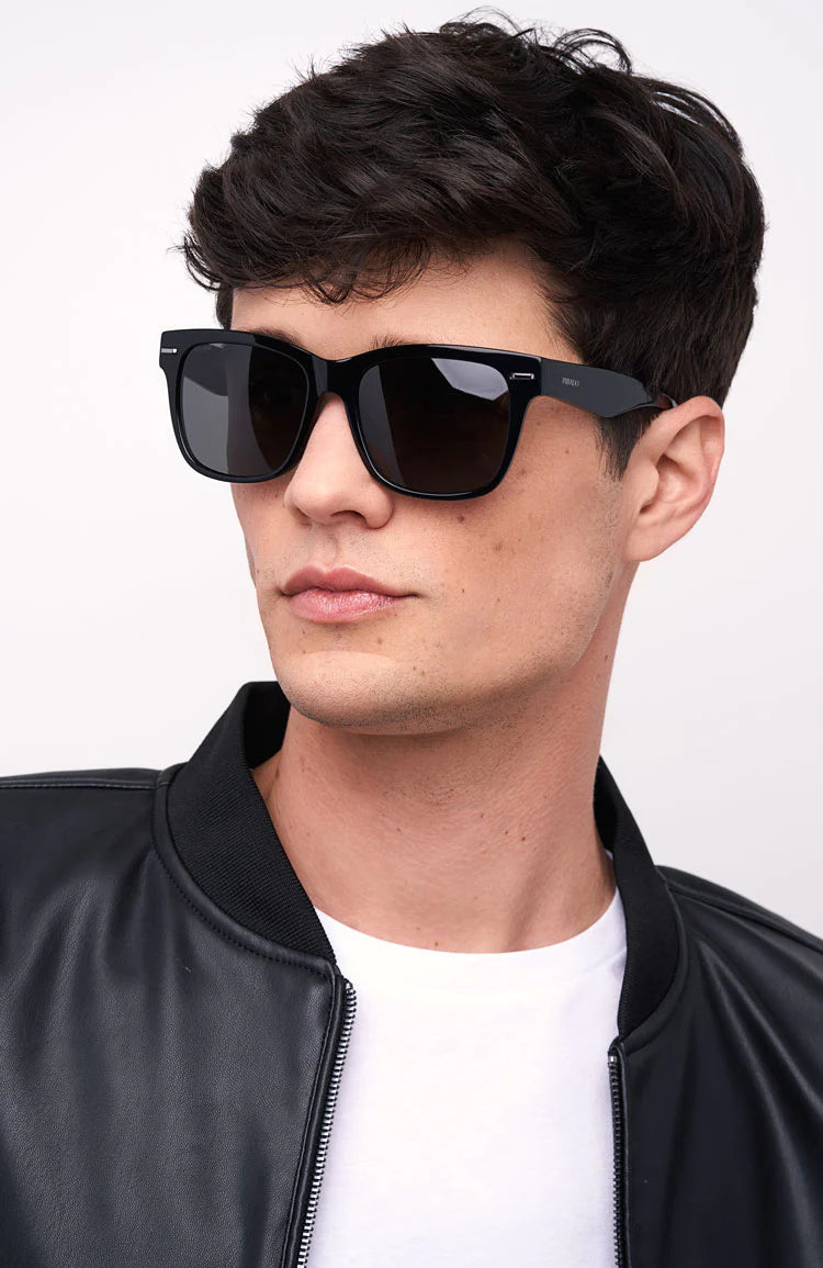 man in black wayfarer sunglasses