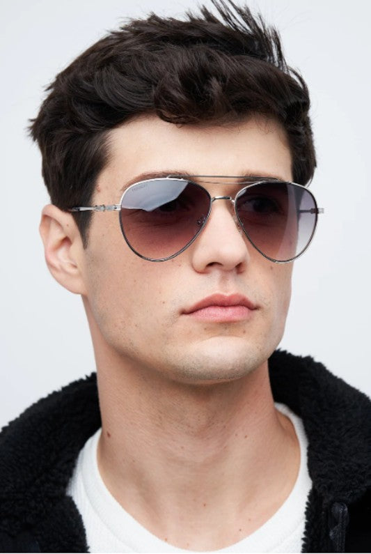 Man wearing designer aviator sunglasses